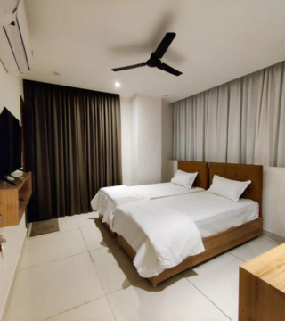 Comfortable Triple Sharing Room at Hotel Hibiscus Tree